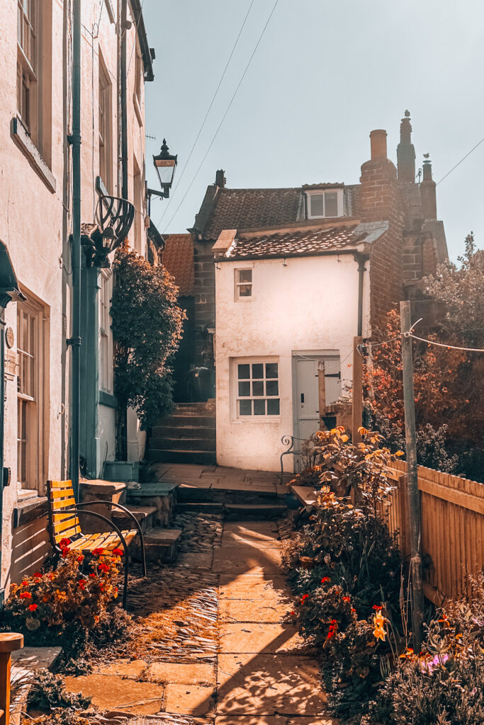 Cobblestone street Bloomswell in Robin Hood’s Bay, lined with cottages and shops